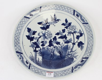 Lot 638 - A Chinese export blue and white charger,...