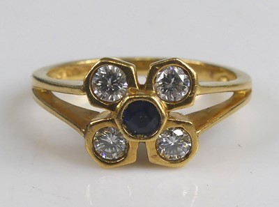Lot 2575 - An 18ct yellow gold sapphire and diamond...