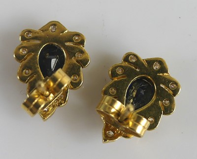 Lot 2576 - A pair of yellow metal sapphire and diamond...