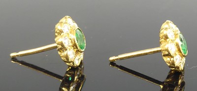 Lot 2577 - A pair of 18ct yellow gold emerald and diamond...