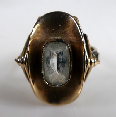 Lot 2610 - A yellow metal blue topaz dress ring,...