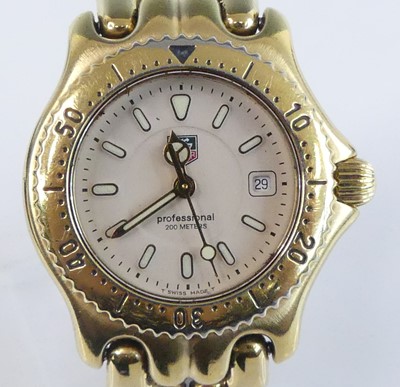 Lot 2632 - A lady's Tag Heuer Professional gold plated...