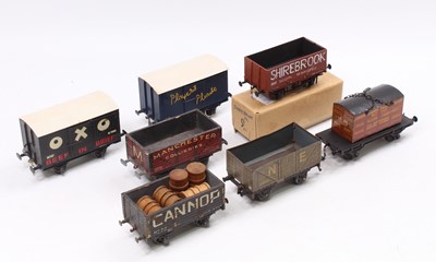 Lot 319 - Seven goods wagons: Bakelite Leeds Model Co....