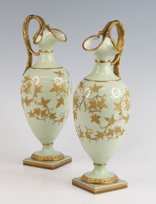 Lot 2041 - A pair of Grainger's Worcester porcelain ewers,...