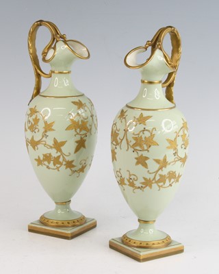 Lot 2041 - A pair of Grainger's Worcester porcelain ewers,...