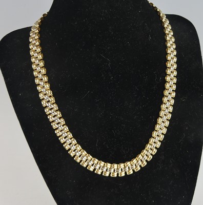 Lot 2672 - A lady's bi-colour 18ct gold necklace, as...