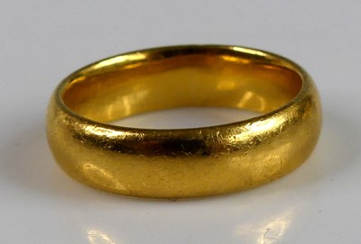Lot 2675 - A 22ct gold court shape wedding band, 7.2g,...