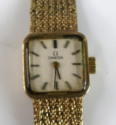 Lot 2600 - A lady's Omega 9ct gold cased bracelet watch,...