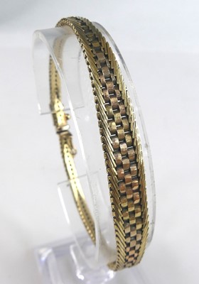 Lot 2598 - A modern 9ct three-colour gold bracelet, of...