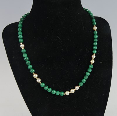 Lot 2627 - A beaded malachite and cultured pearl necklace,...