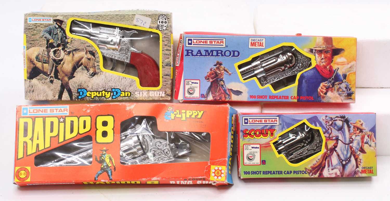 Lot 1873 - A collection of Lonestar boxed cap guns to...