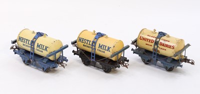 Lot 299 - Three Hornby 0-gauge Milk tank wagons: 1933-4...