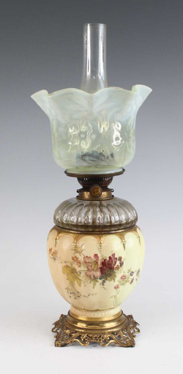 Lot 2042 - A Royal Worcester oil lamp, circa 1893, the...