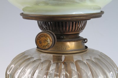 Lot 2042 - A Royal Worcester oil lamp, circa 1893, the...