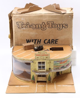 Lot 1803 - Triang Toys wooden and card garage and...