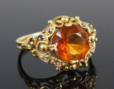 Lot 2701 - A yellow metal, citrine and diamond ring,...