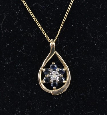 Lot 2709 - A 9ct yellow gold, sapphire and diamond...