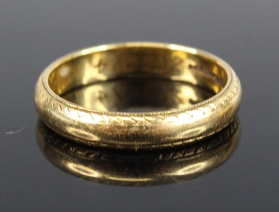 Lot 2727 - A modern 18ct gold court shaped wedding band,...