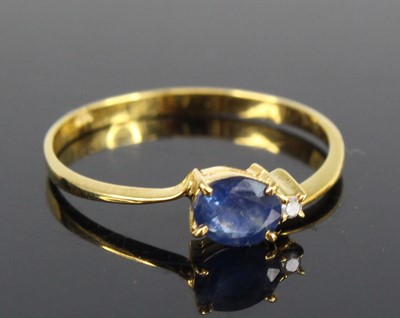 Lot 2663 - A contemporary yellow metal, sapphire and...
