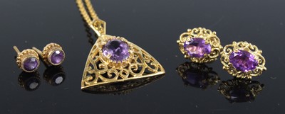 Lot 2753 - A modern 9ct gold amethyst set pendant, on...