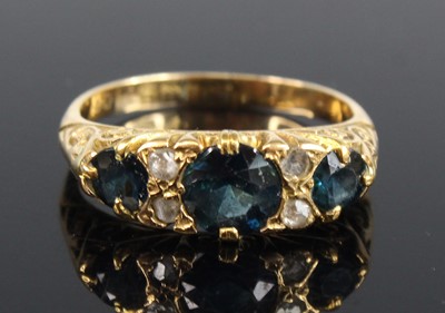 Lot 2733 - An 18ct yellow gold sapphire and diamond half...