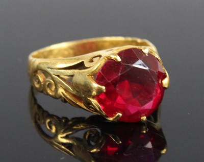 Lot 450 - A yellow metal synthetic ruby single stone...