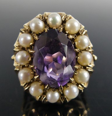 Lot 2763 - A yellow metal amethyst and pearl oval cluster...