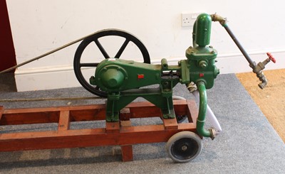 Lot 86 - Wooden trolley mounted cast iron water pump,...