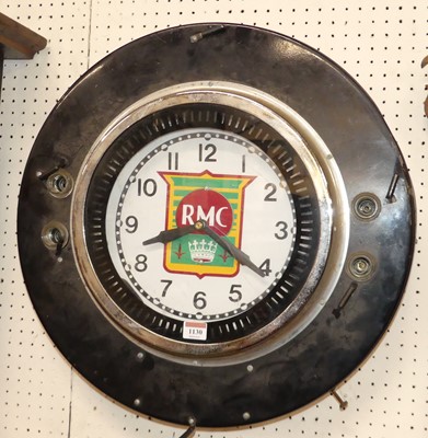 Lot 1122 - A painted metal electrical circular wall clock