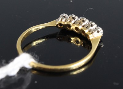 Lot 365 - An 18ct gold platinum and diamond five stone...