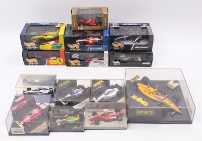 Lot 906 - A collection of Formula 1 diecasts, including...