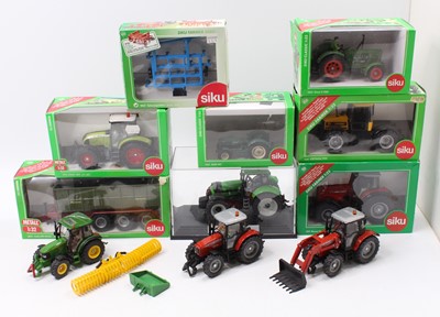 Lot 772 - A collection of Siku 1/32nd scale boxed and...