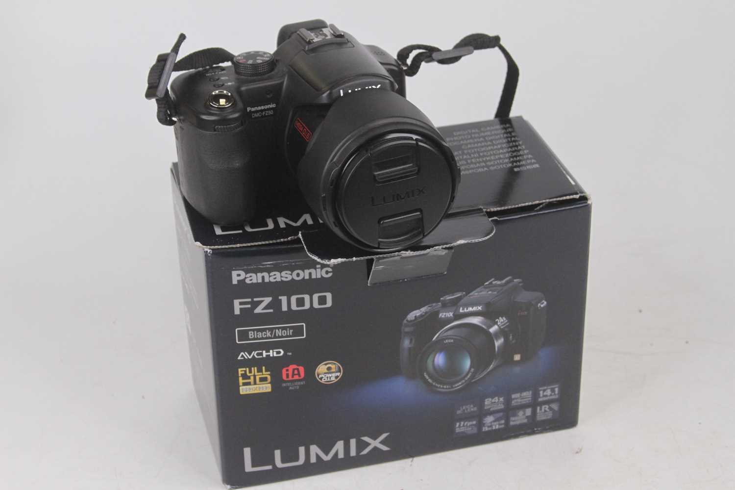 Lot 605 - A Panasonic DMC-FZ100 digital camera, boxed...