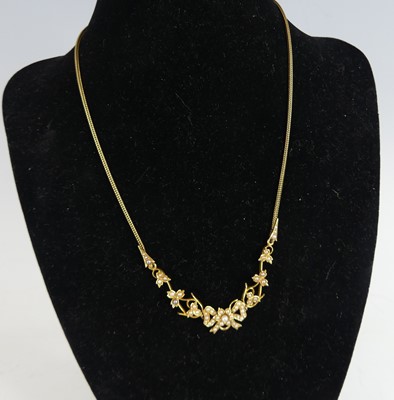 Lot 2646 - A yellow metal seed pearl necklace,...
