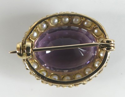 Lot 2582 - A 9ct yellow gold, amethyst and pearl oval...