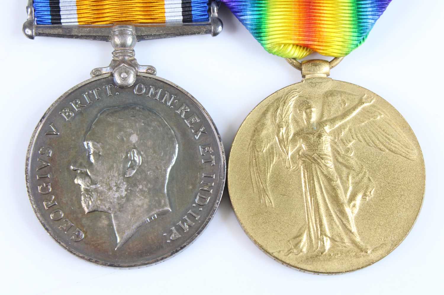 Lot 12 - A WW I British War and Victory pair, naming...