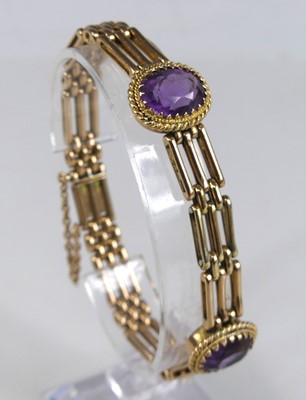 Lot 2667 - A Victorian style 9ct gold and amethyst set...