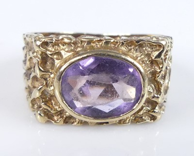 Lot 2793 - A modern 9ct gold and amethyst set dress ring,...