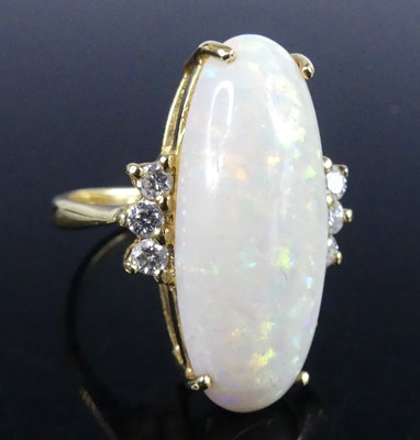 Lot 2795 - A modern 18ct gold opal and diamond set dress...