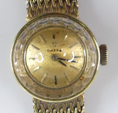 Lot 2746 - A lady's Omega 18ct gold cased bracelet watch,...