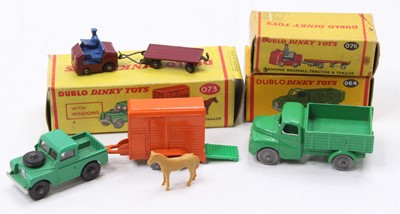 Lot 430 - Three Dublo Dinky Toys: 073 Land Rover black...