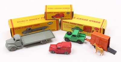 Lot 449 - Three Dublo Dinky Toys: 073 Land Rover &...