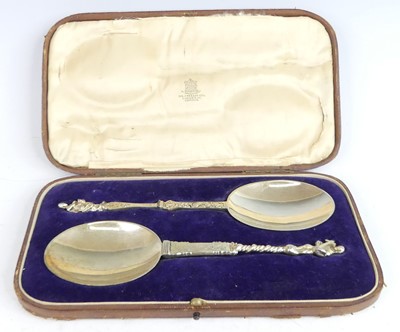 Lot 2140 - A cased pair of George V silver-gilt apostle...