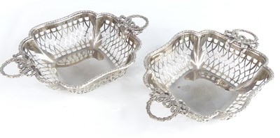 Lot 2138 - A pair of George V silver twin handled...