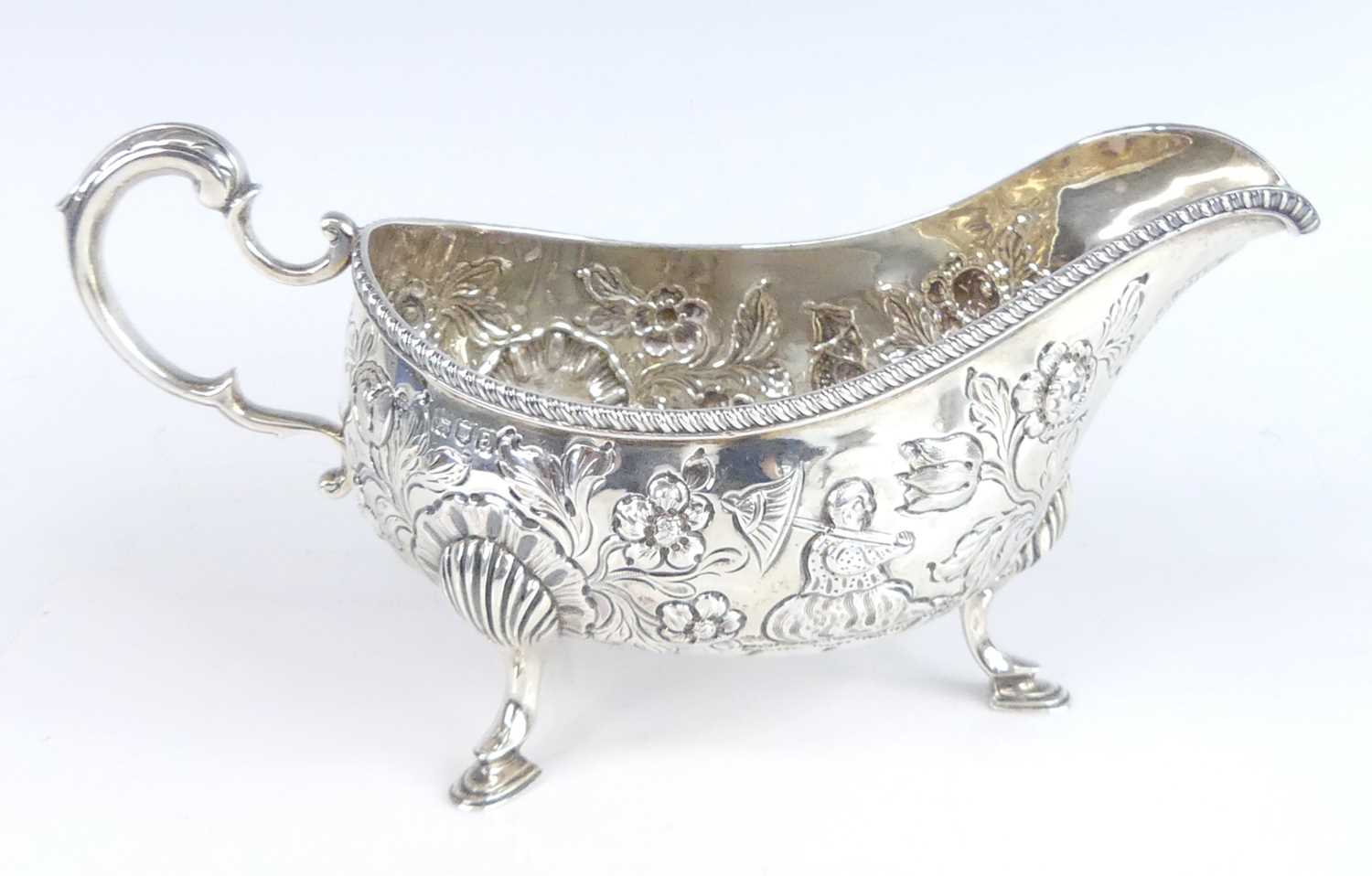 Lot 2099 - A late Victorian silver sauceboat, having...