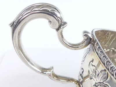 Lot 2099 - A late Victorian silver sauceboat, having...