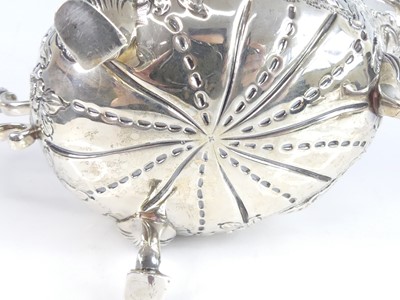 Lot 2099 - A late Victorian silver sauceboat, having...