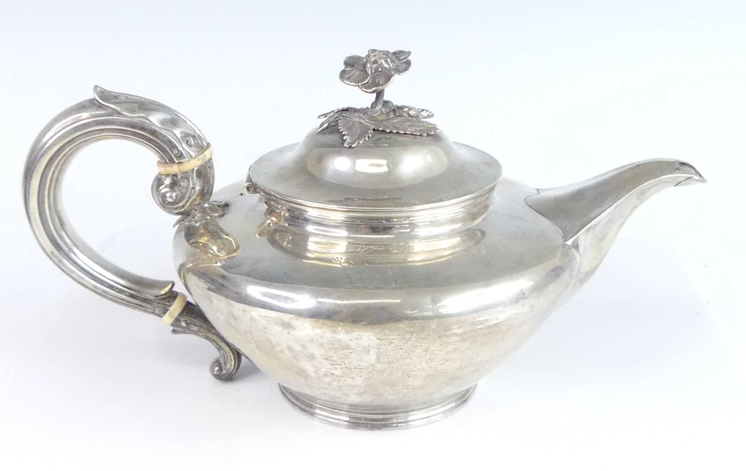 Lot 2085 - A William IV silver teapot, the body of squat...