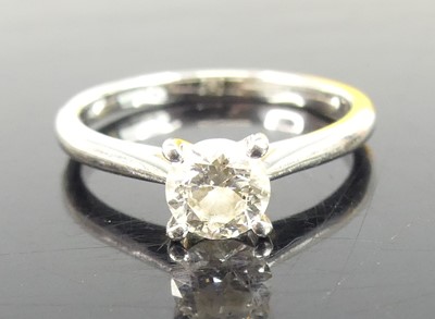 Lot 2736 - A platinum diamond solitaire ring, comprising...