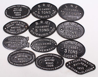 Lot 48 - A collection of 12 cast iron makers plates,...